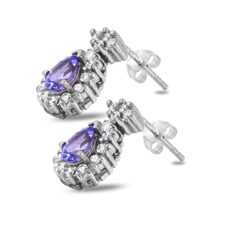 Squisiti orecchini con tanzanite naturale da 1,75 carati e diamante in oro bianco massiccio 14 carati

Un pezzo dall'aspetto straordinario!

Peso totale dei diamanti bianchi naturali taglio rotondo: 0,75 carati (colore F-G / purezza VS2-SI1)

Peso