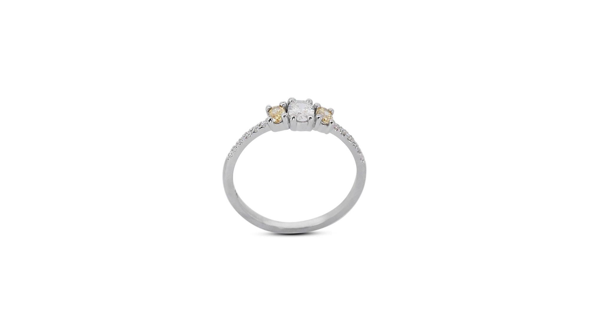 Exquisite 18 kt. White Gold Ring with 0.62 ct Total Natural Diamond - IGI Cert 3