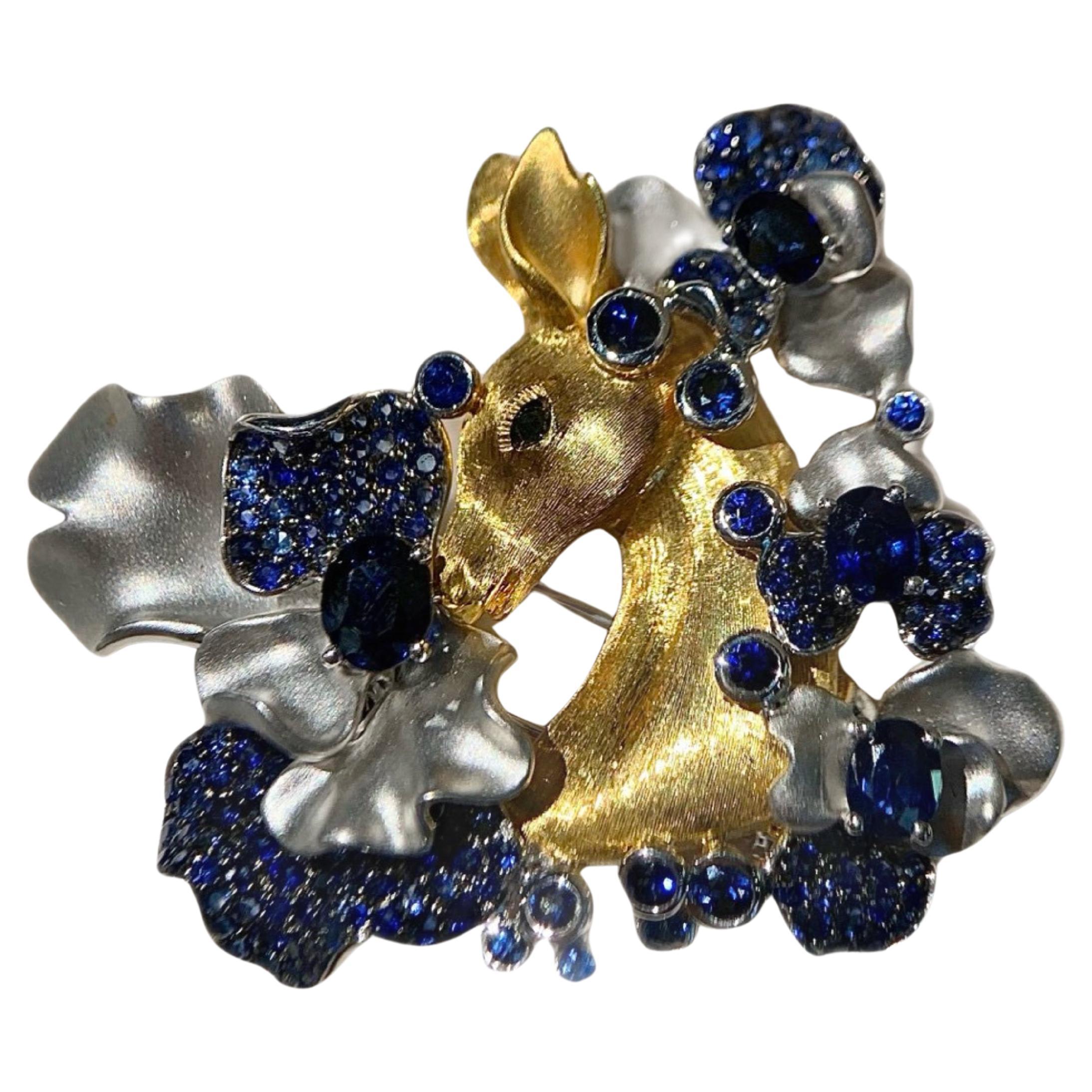 Exquisite Hirschbrosche aus 18K Gold mit Saphiren (florales Design)