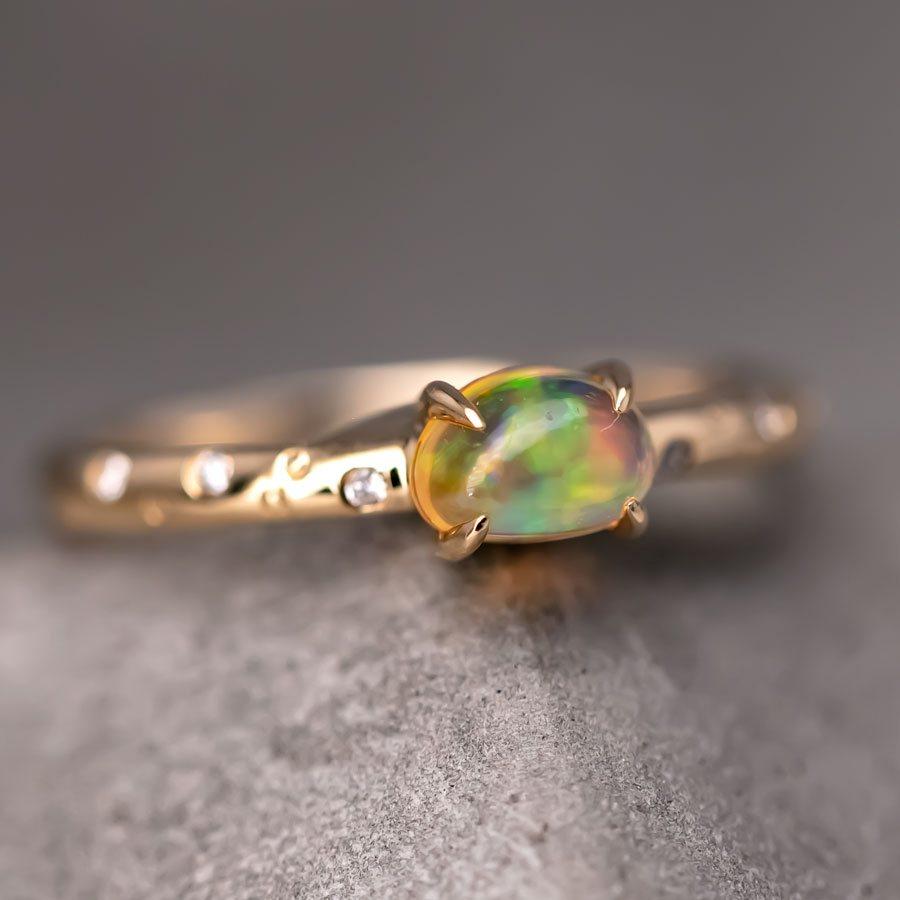 Exquisite 18K Yellow Gold Engagement Ring with Mexican Fire Opal and Diamonds.


Free Domestic USPS First Class Shipping! Free Gift Bag or Box with every order!



Opal—the queen of gemstones, is one of the most beautiful gemstones in the world.