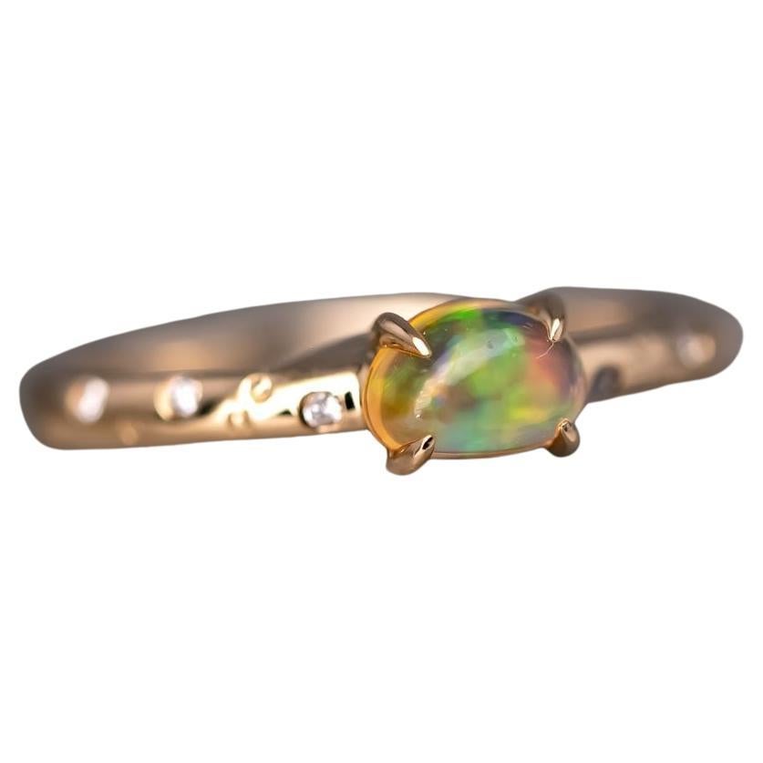 Exquisiter Verlobungsring aus 18 Karat Gold mit mexikanischem Feueropal-Diamanten