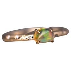 Exquisite 18K Gold Engagement Ring with Mexican Fire Opal Diamonds