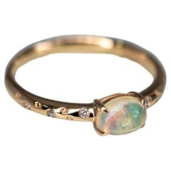 Exquisite 18K Gold Engagement Ring with Mexican Fire Opal Diamonds