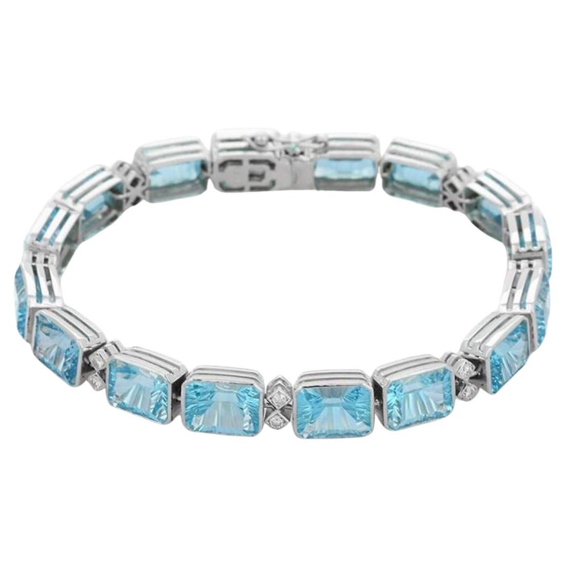 Exquisite 18k White Gold Diamond and Fine Cut 40Carat Blue Topaz Tennis Bracelet