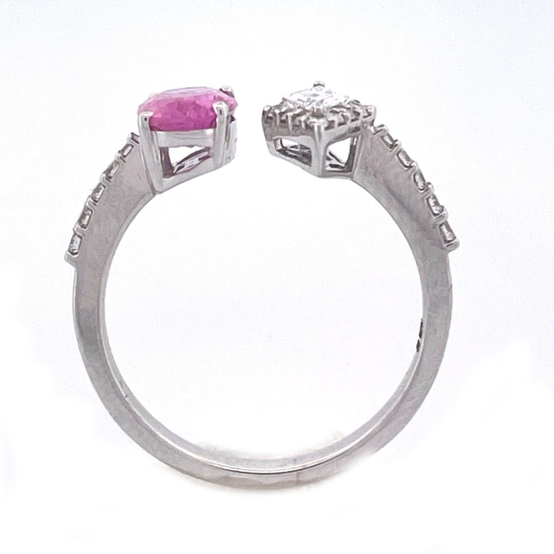 Exquisite 18k White Gold Diamond and Ruby Ring

Indulge in the captivating beauty of this exquisite 18k white gold diamond and ruby ring. The ring features a split-end design, with one end adorned with a stunning ruby of 1.09 carats, and the other