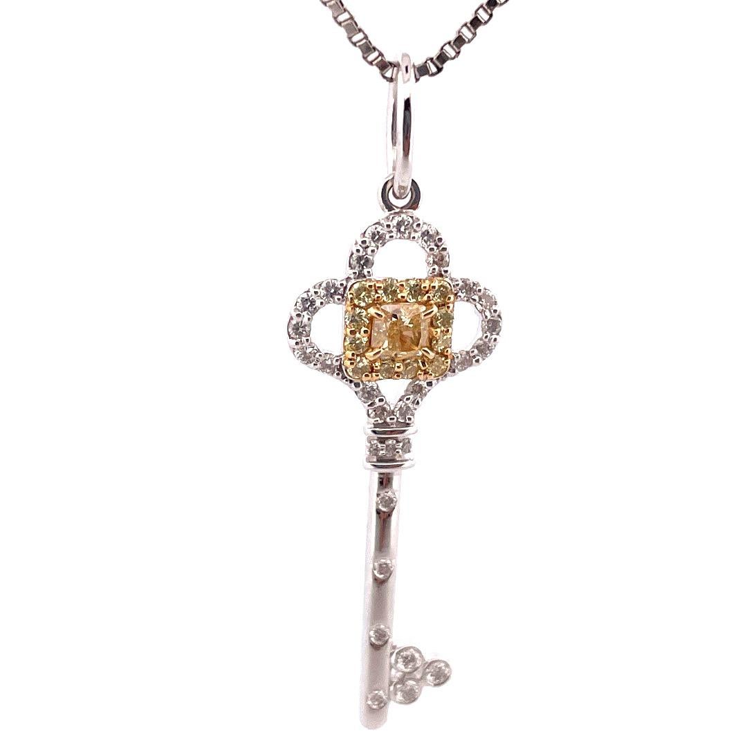 Exquisite 18k White Gold Diamond Key Necklace

Unlock a world of elegance with this stunning 18k white gold diamond key pendant. Adorned with sparkling diamonds, this key pendant features a brilliant combination of yellow and white diamonds total