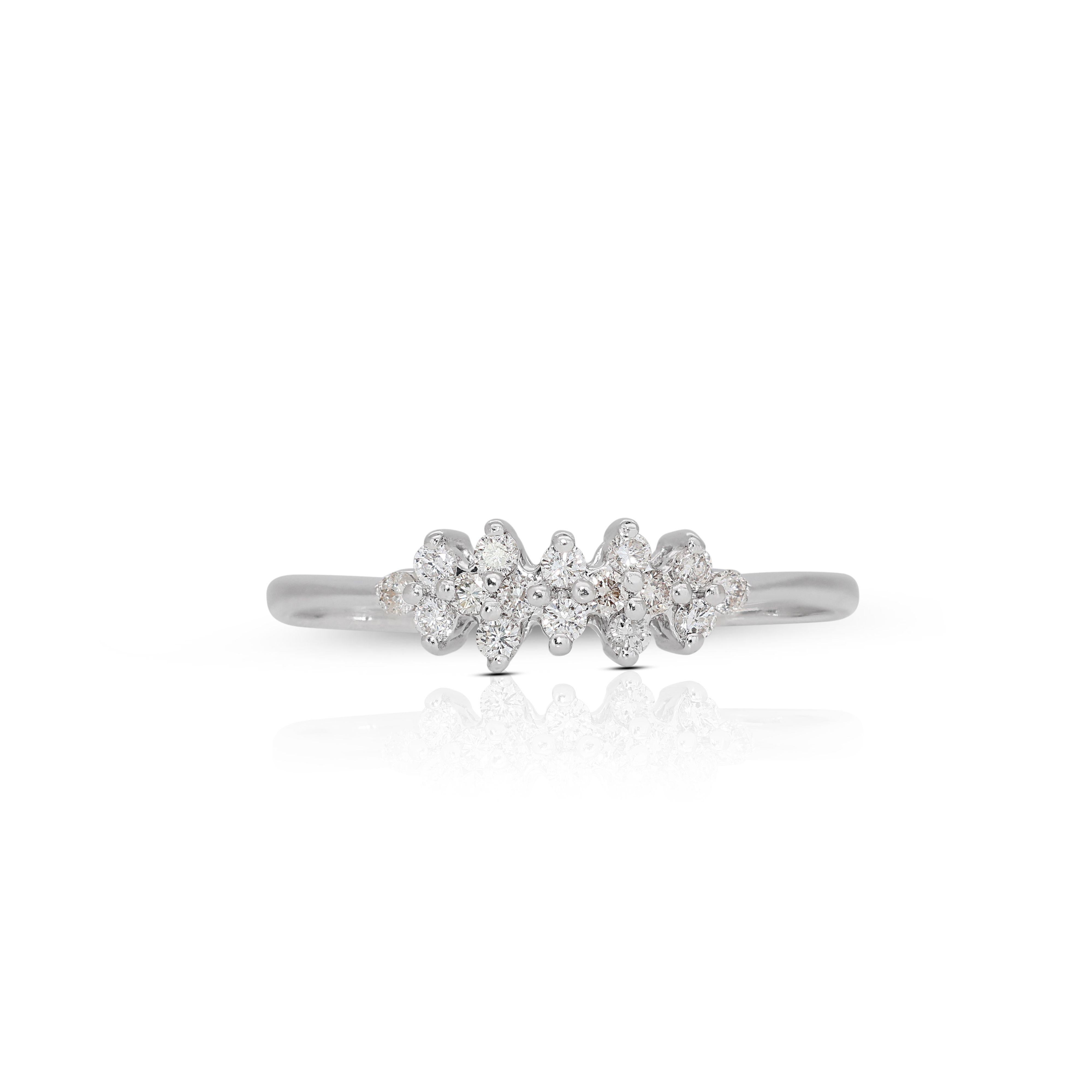 This Exquisite 0.20ct Diamond Ring in 18K White Gold is a versatile and meaningful accessory, suitable for various occasions, from engagements to formal events or simply as a symbol of timeless elegance. Its design complements a wide range of