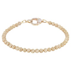 Bracelet tennis exquis en or jaune 18 carats, diamants 6,5 carats