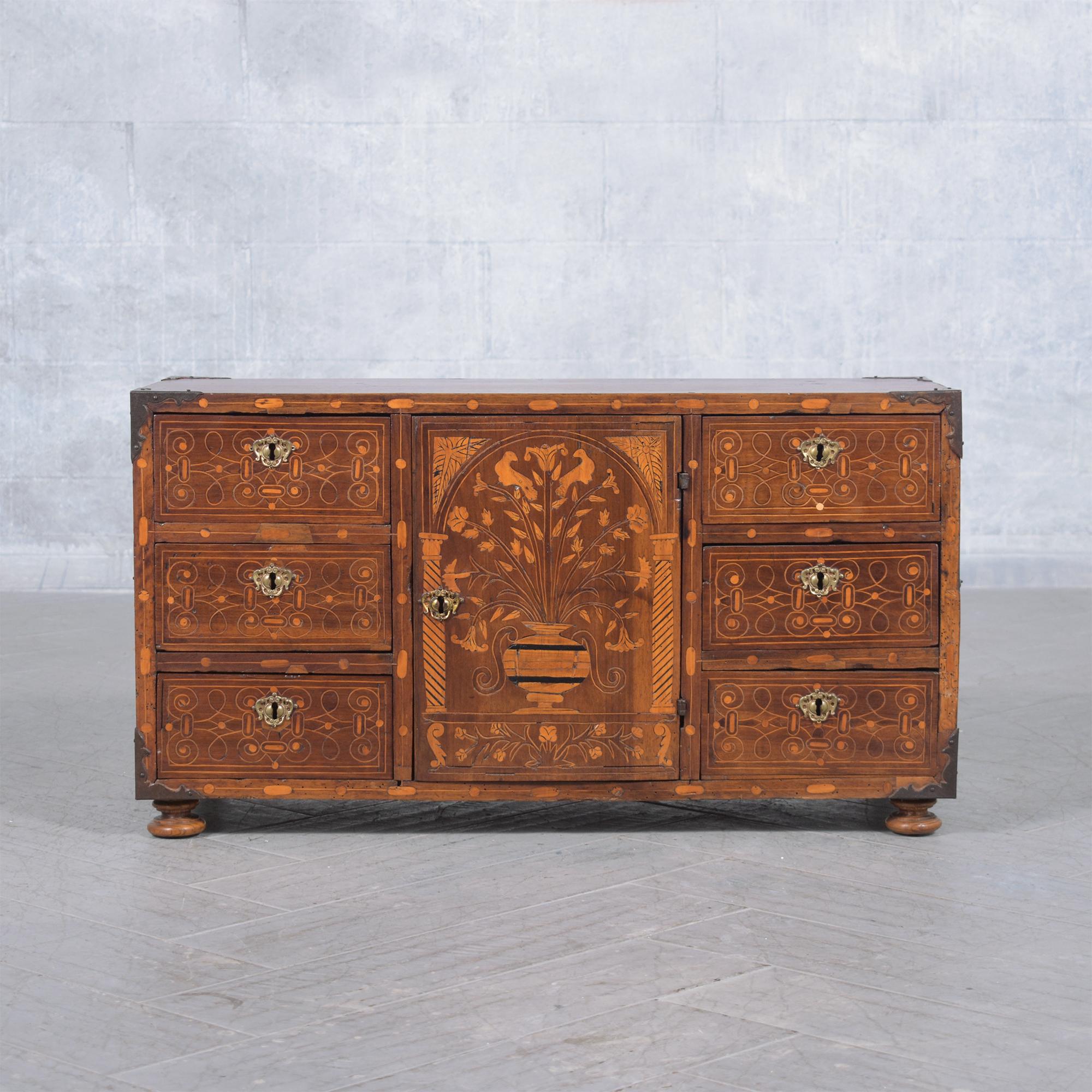Delve into the world of historic elegance with our newly restored 18th-century Spanish bargueño cabinet, a timeless masterpiece from circa 1750s. This iconic cabinet, meticulously crafted from premium walnut wood, boasts intricate marquetry inlays