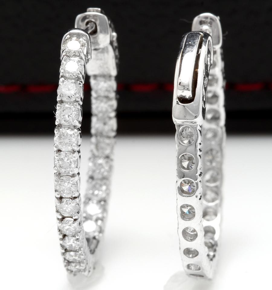 Exquisite 1.95 Carats Natural Diamond 14K Solid White Gold Hoop Earrings

Amazing looking piece!

Inside Out Diamonds.

Earrings have a safety lock.

Total Natural Round Cut White Diamonds Weight: 1.95 Carats (color G-H / Clarity SI1-SI2)

Earring