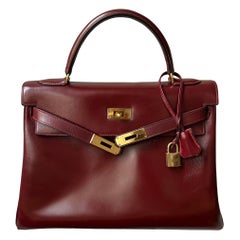 Exquisite 1955 Hermès Kelly 32 Retourné Rouge H Box Calf Leather Handbag Exquisite 1955 Hermès Kelly 32 Retourné Rouge H Box Calf Leather Handbag