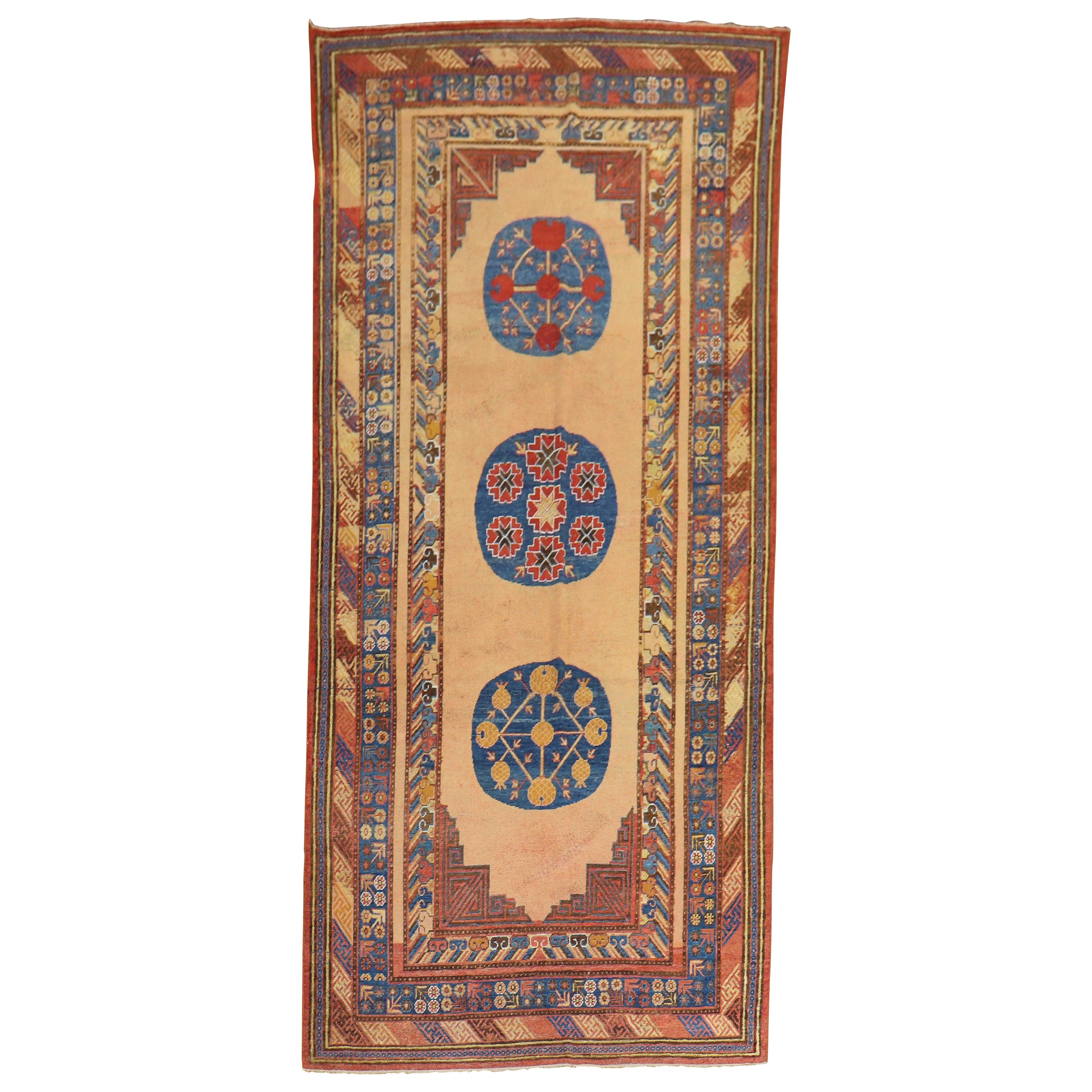 Magnifique tapis Khotan ancien du 19ème siècle du Turkestan oriental