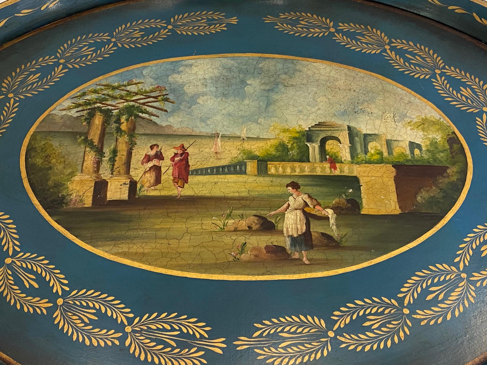 Exquisite French antique tole tray having detailed handpainted figural scene with ancient buildings and sailboats. Marvelous coloration and gilding with natural craquelure and wear that adds to the beauty.