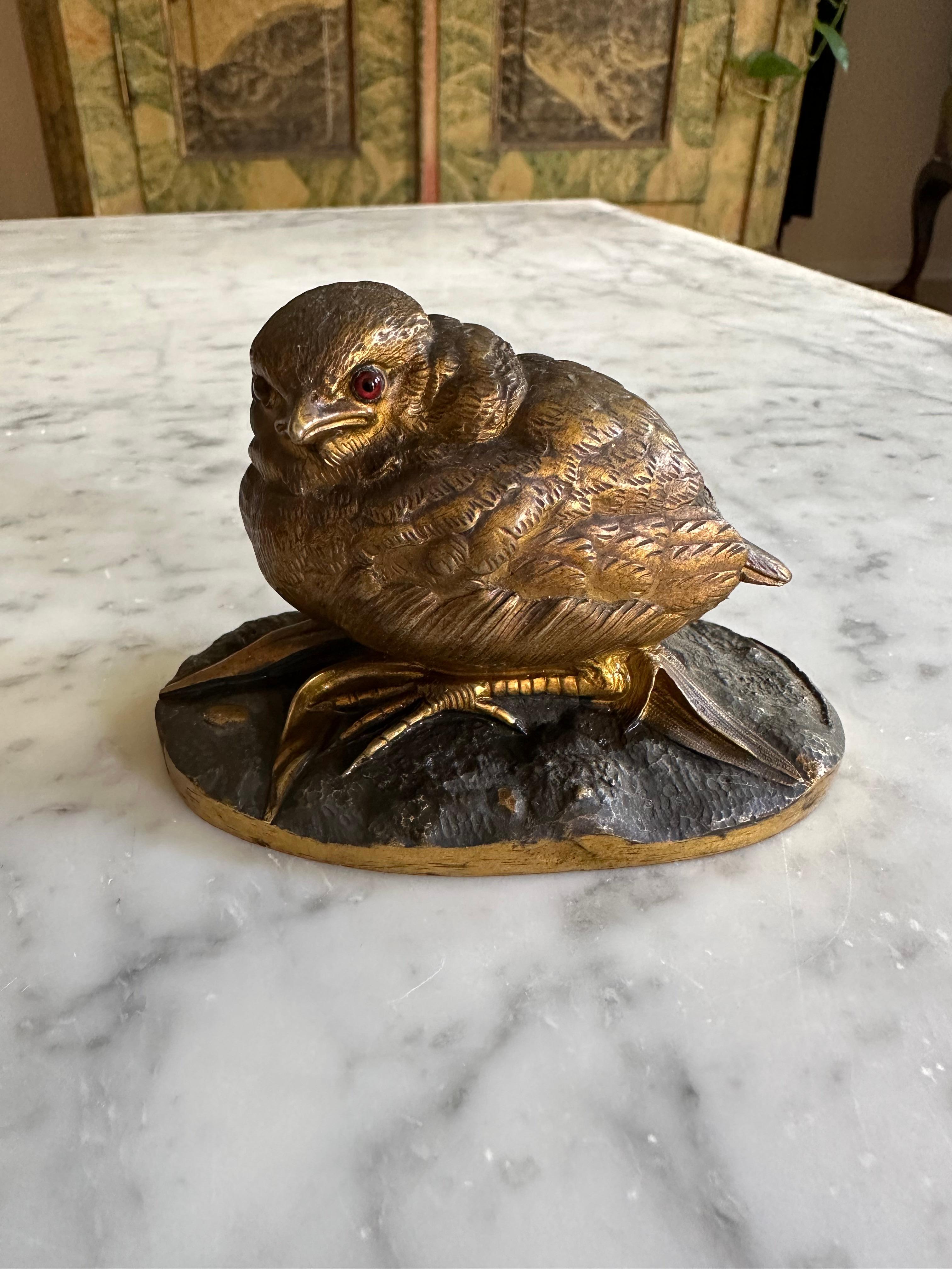 Discover the timeless elegance of the 19th century with this charming bronze sculpture of a sparrow, crafted by the esteemed Parisian sculptor Louis Villeminot. Born in 1826, Villeminot was a master of his craft, exhibiting his work at the Paris