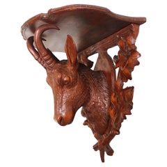 Exquisite 19th century Swiss Black Forest Chamois wall shelf / bracket / console
