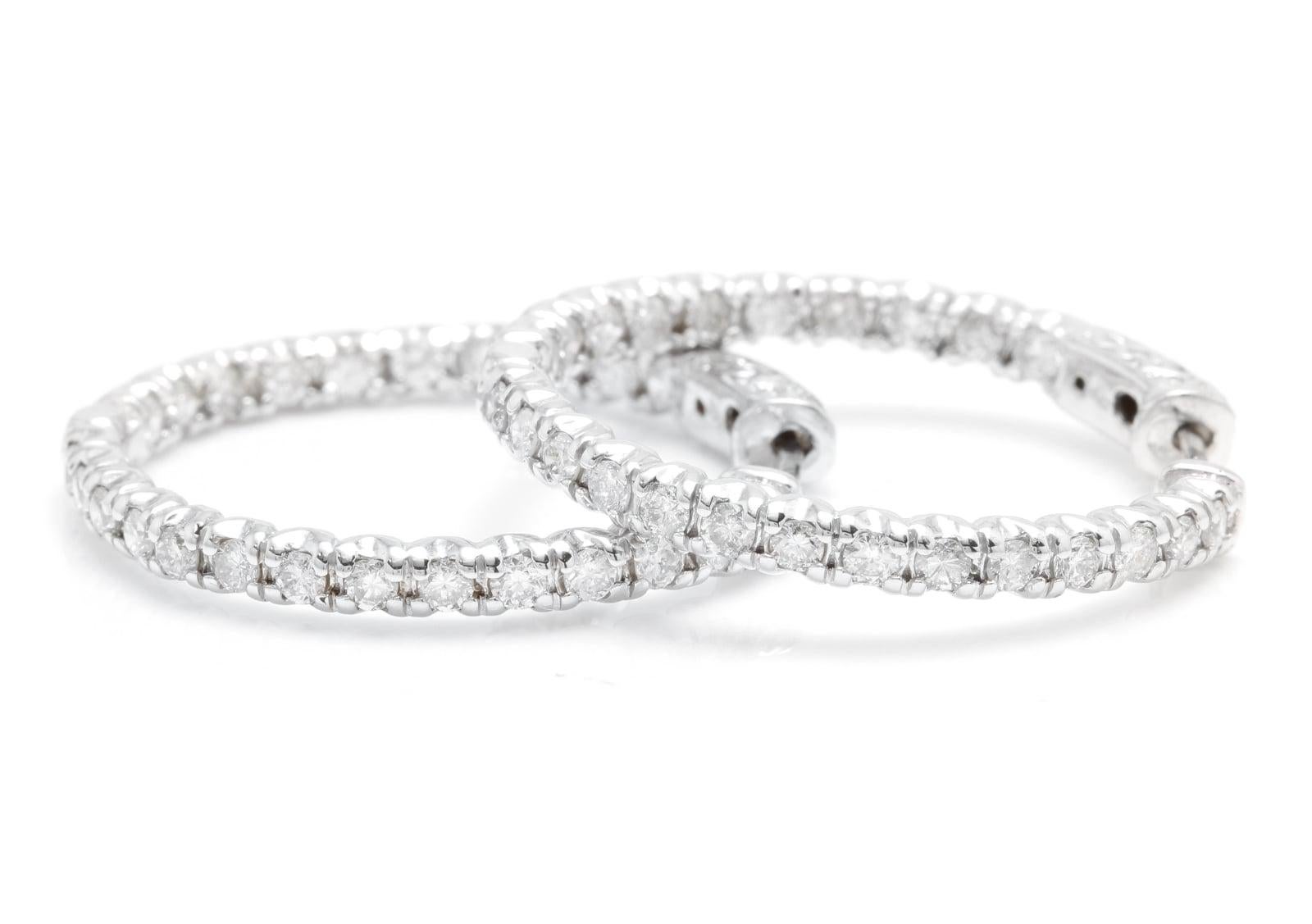 Exquisite 2.00 Carats Natural Diamond 14K Solid White Gold Hoop Earrings

Amazing looking piece!

Inside Out Diamonds.

Total Natural Round Cut White Diamonds Weight: Approx. 2.00 Carats (color G-H / Clarity SI1-SI2)

Earring Measures: 27mm

The