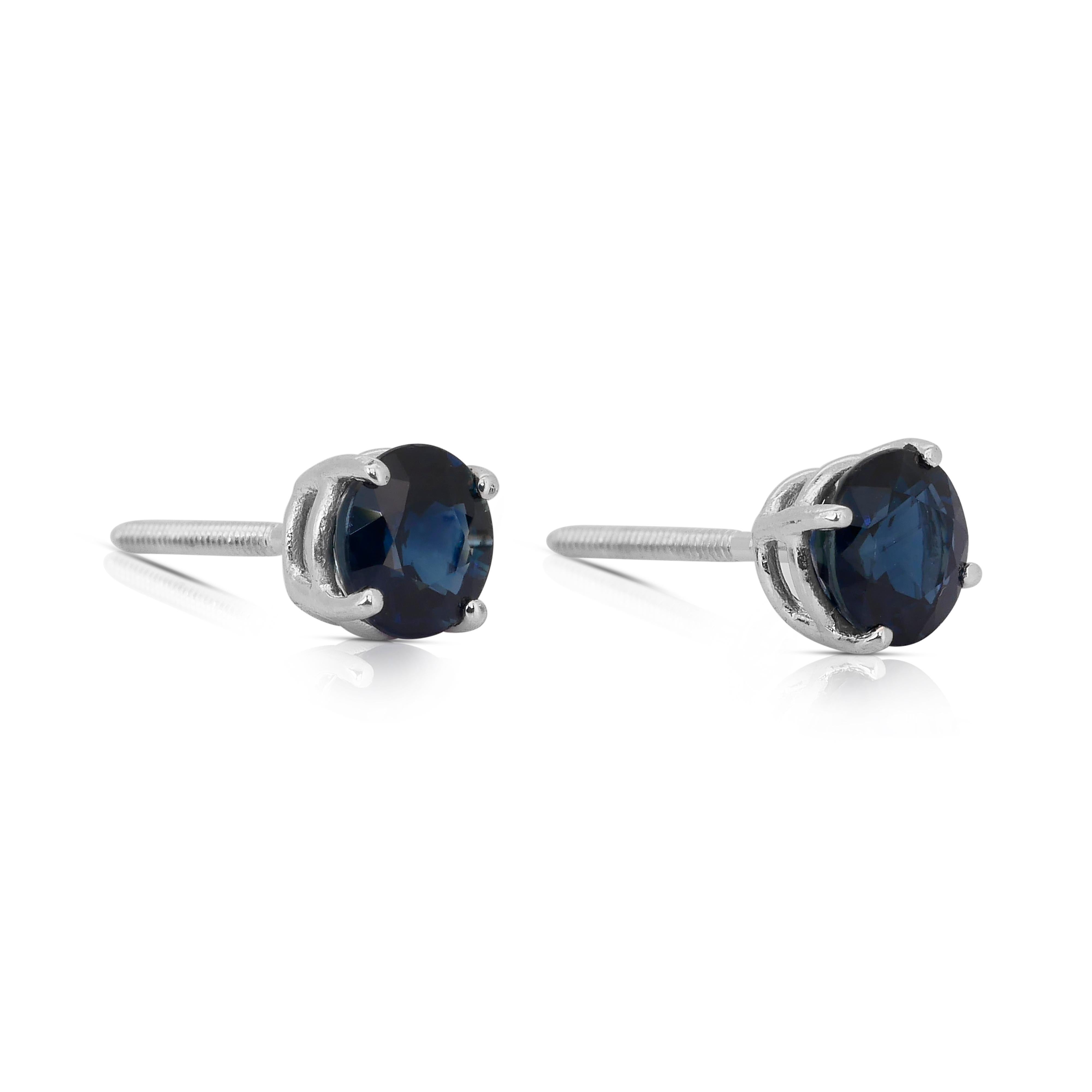 Exquisite 2.01ct Sapphire Stud Earrings in Platinum - IGI Certified

Exuding timeless charm, these platinum earrings feature two mesmerizing round-cut sapphires totaling 2.01ct. Their rich, dark blue hue offers an air of elegance, perfectly