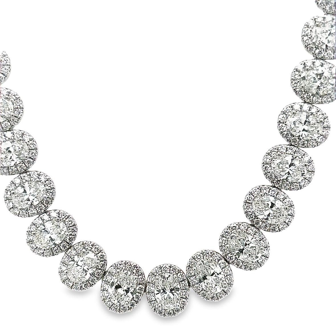 Crafted with exquisite 20.93CT T.W. diamonds, this statement necklace exudes luxury and sophistication. Elegantly designed in an oval cut, its sleek appearance accentuates any outfit and will be the perfect accessory for red-carpet occasions.