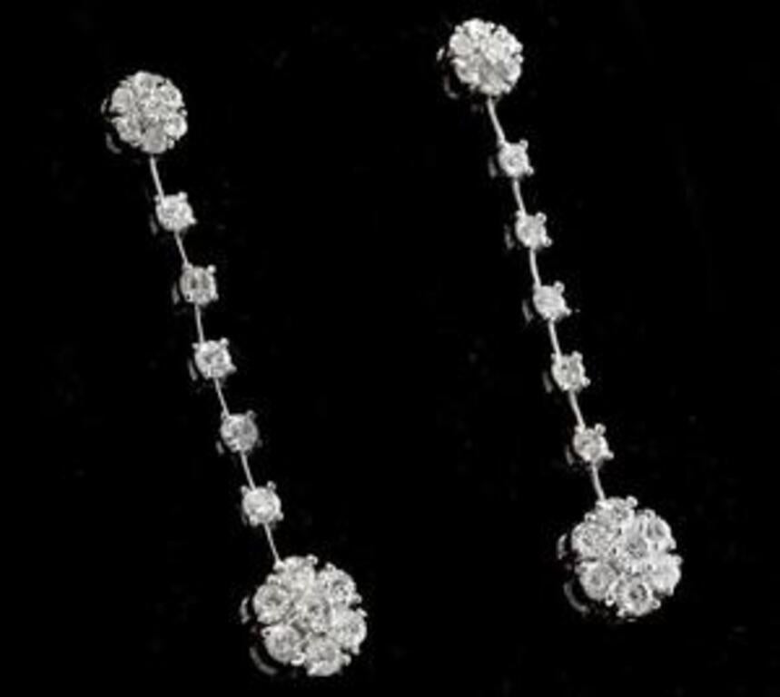Exquisite 2.10 Carats Natural VS1-VS2 Diamond 14K Solid White Gold Earrings

Amazing looking piece!

Total Natural Round Cut Diamonds Weight: 2.10 Carats (both earrings) VS1-VS2 / F-G

Diameter of the Earring is: 8.1mm

Length of the earrings is: