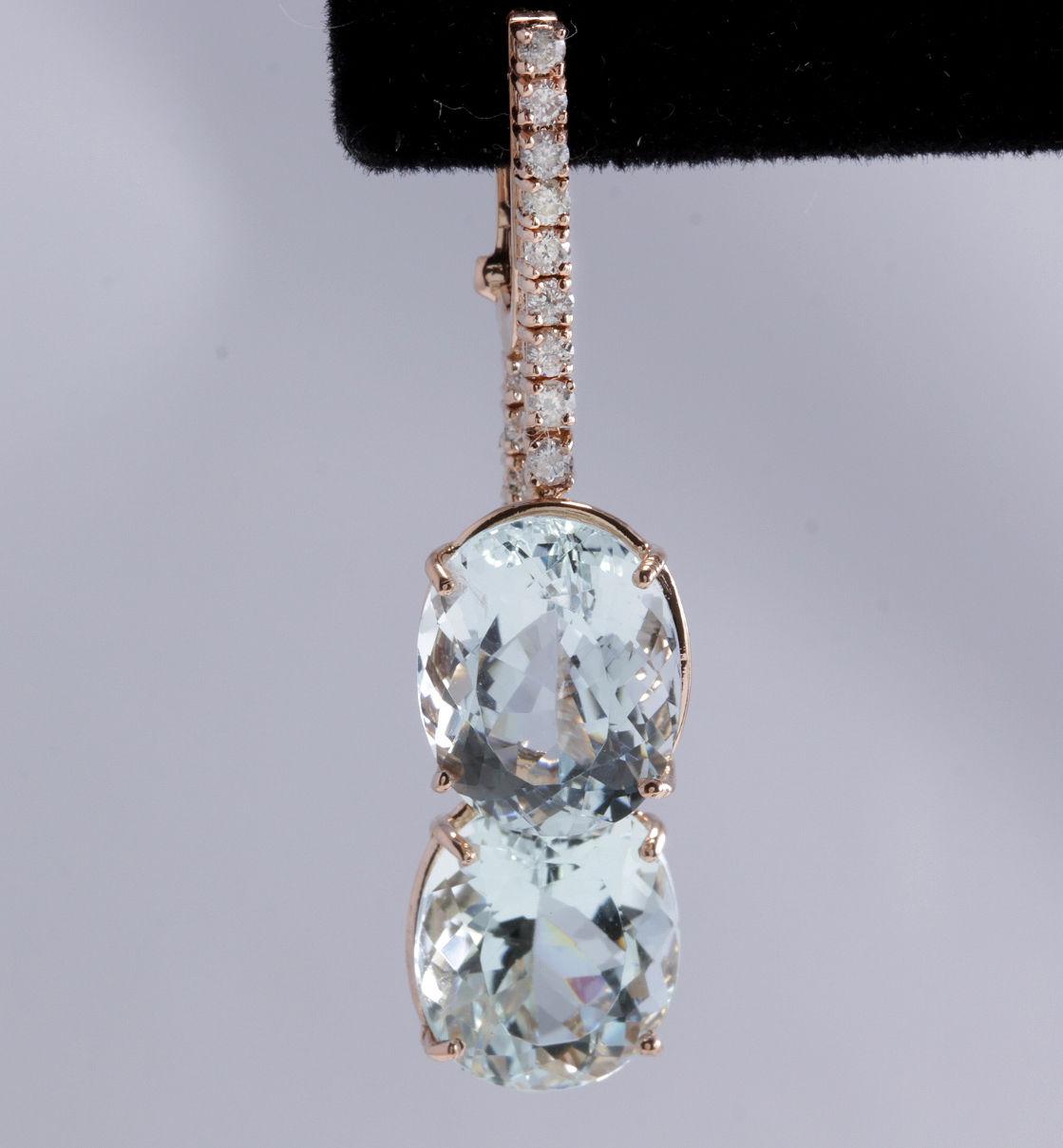 Exquisite 21.79 Carats Natural Aquamarine and Diamond 14K Solid Rose Gold Earrings

Amazing looking piece!

Total Natural Round Cut White Diamonds Weight: .85 Carats (color F-G / Clarity SI1-SI2)

Total Natural Oval Cut Blue Aquamarines Weight is: