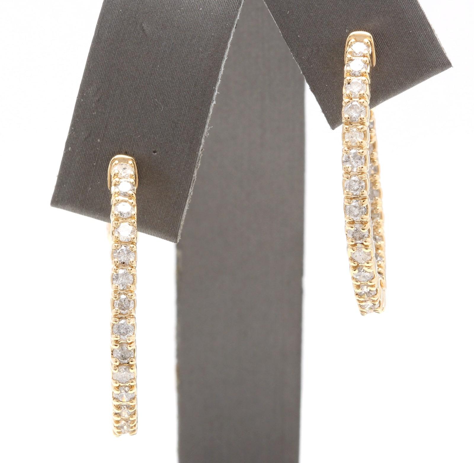 Exquisite 2.25 Carats Natural Diamond 14K Solid Yellow Gold Hoop Earrings

Amazing looking piece!

Inside Out Diamonds.

Earrings have safety lock.

Total Natural Round Cut White Diamonds Weight: Approx. 2.25 Carats (color G-H / Clarity