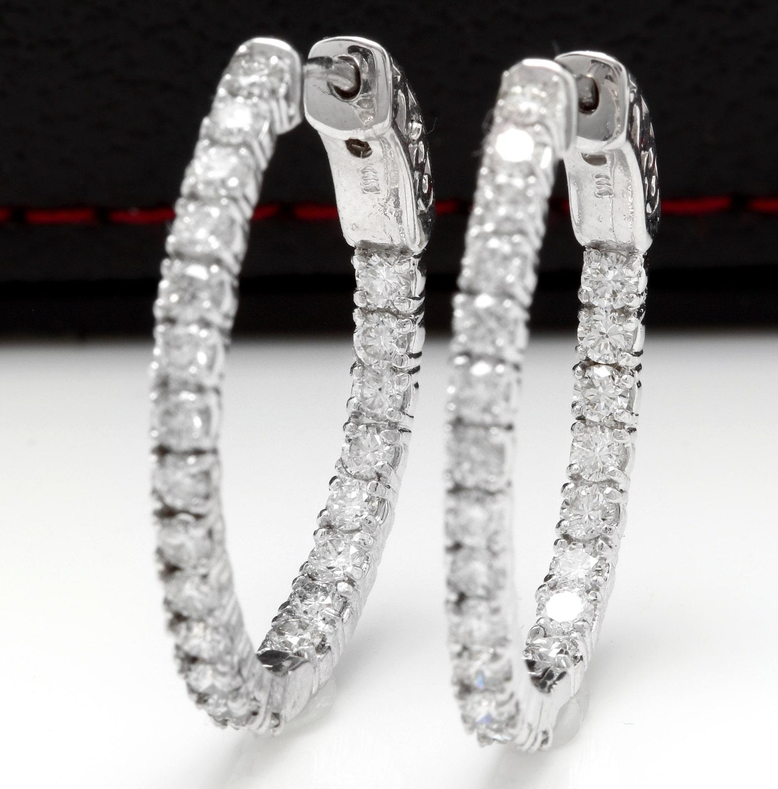 Exquisite 2.25 Carats Natural Diamond 14K Solid White Gold Hoop Earrings

Amazing looking piece!

Inside Out Diamonds.

Earrings have a safety lock.

Total Natural Round Cut White Diamonds Weight: 2.25 Carats (color G-H / Clarity SI1-SI2)

Earring