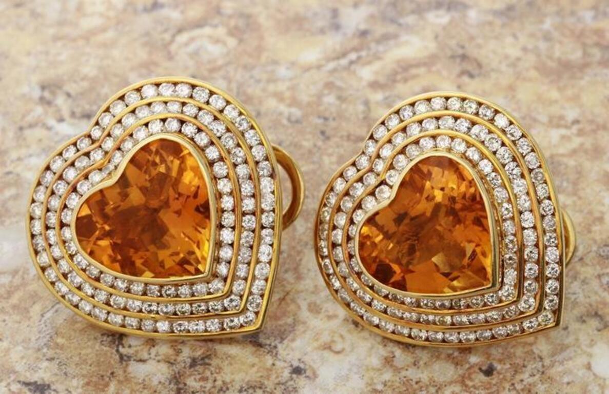 Exquisite 25.75 Carats Natural Madeira Citrine and Diamond 14K Solid Yellow Gold Earrings

Amazing looking piece!

Total Natural Round Cut White Diamonds Weight: 5.75 Carats (color G-H / Clarity SI1-SI2)

Total Natural Heart Madeira Citrine Weight