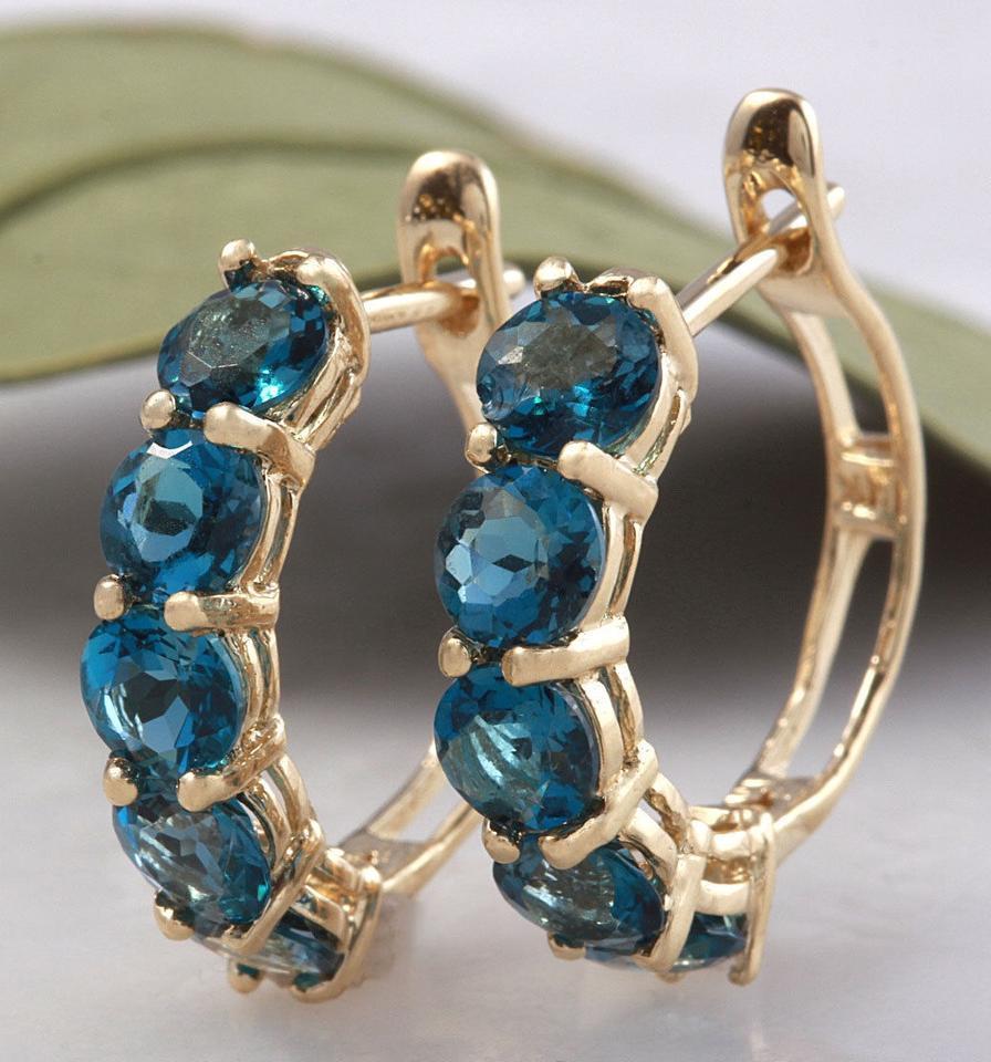 Boucles d'oreilles Huggie en or jaune massif 14K avec topaze bleue de Londres naturelle de 2,60 carats, de qualité supérieure

Une pièce étonnante !

Poids total de la topaze bleue de Londres de forme ronde : 2,60 carats (les deux boucles