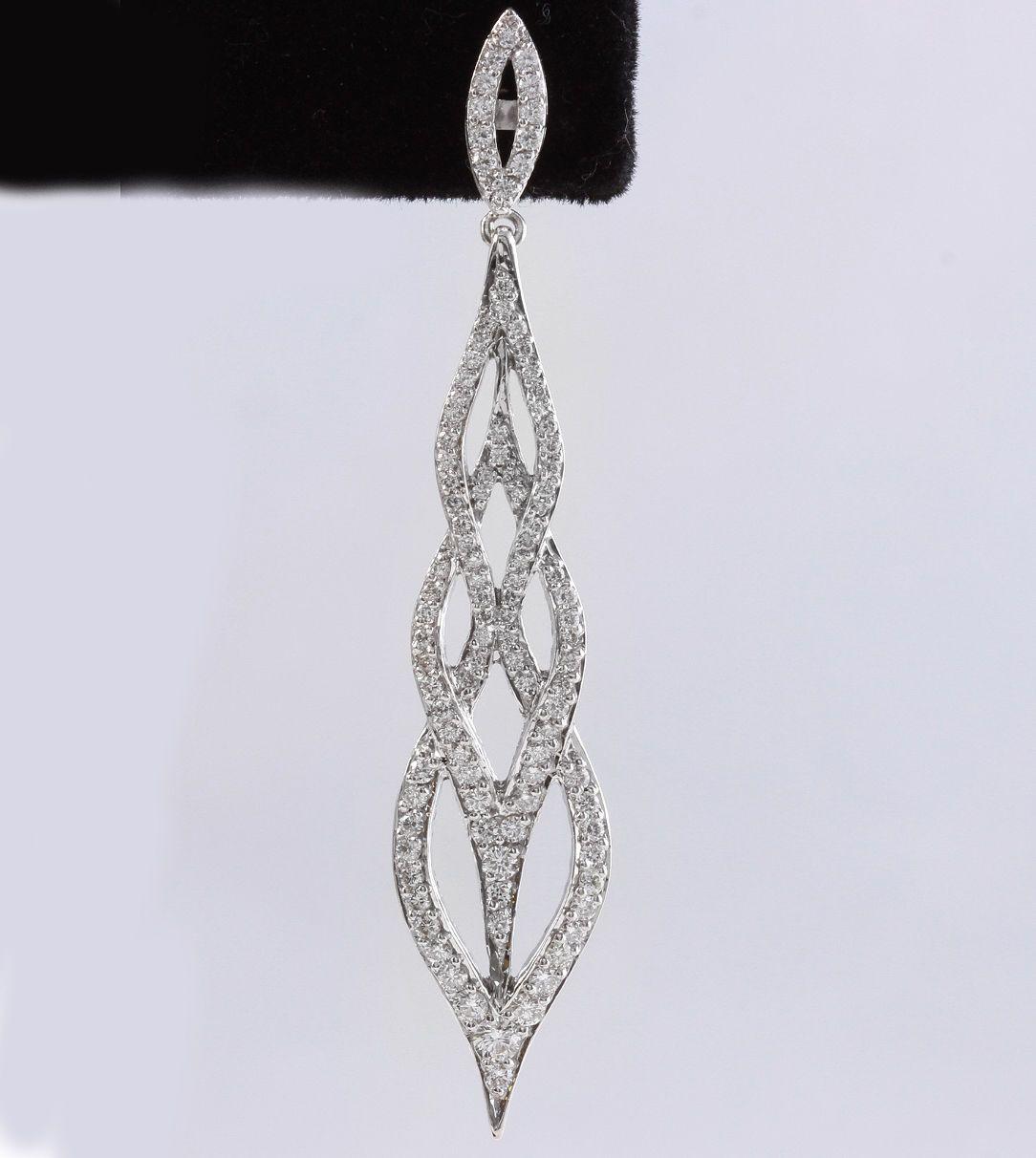 Exquisite 2.62 Carats Natural Diamond 18K Solid White Gold Earrings

Amazing looking piece!

Total Natural Round Cut White Diamonds Weight: 2.62 Carats (color E-F / Clarity VVS1-VVS2)

Earring measurements are: 64 x 12.5mm

Total Earrings Weight is: