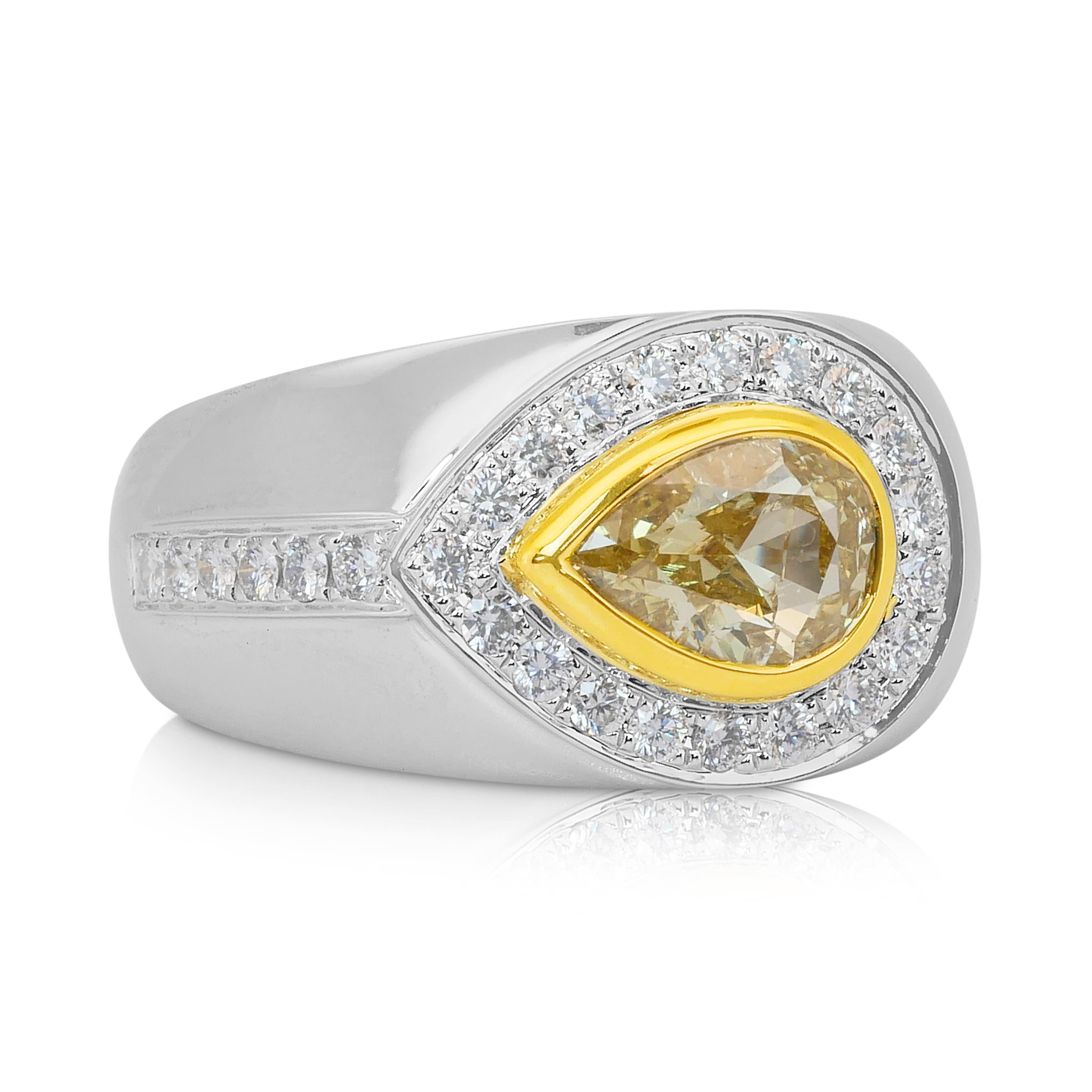 Bague exquise de 2.91ct diamants en or blanc et jaune 18k - certifié IGI

Cette bague exquise est ornée d'un magnifique diamant en forme de poire de 2,08ct dans une rare teinte jaune vif, pleine d'étincelles dorées et de chaleur. Sertie dans de l'or