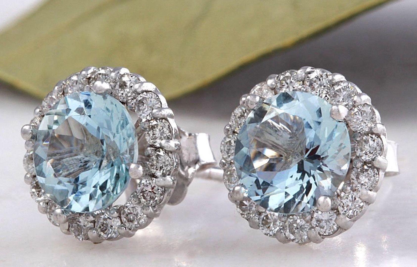 Exquisite 3.05 Carats Natural Aquamarine and Diamond 14K Solid White Gold Stud Earrings

Amazing looking piece!

Total Natural Round Cut White Diamonds Weight: .60 Carats (color G-H / Clarity SI1-SI2)

Total Natural Round Cut Aquamarines Weight: