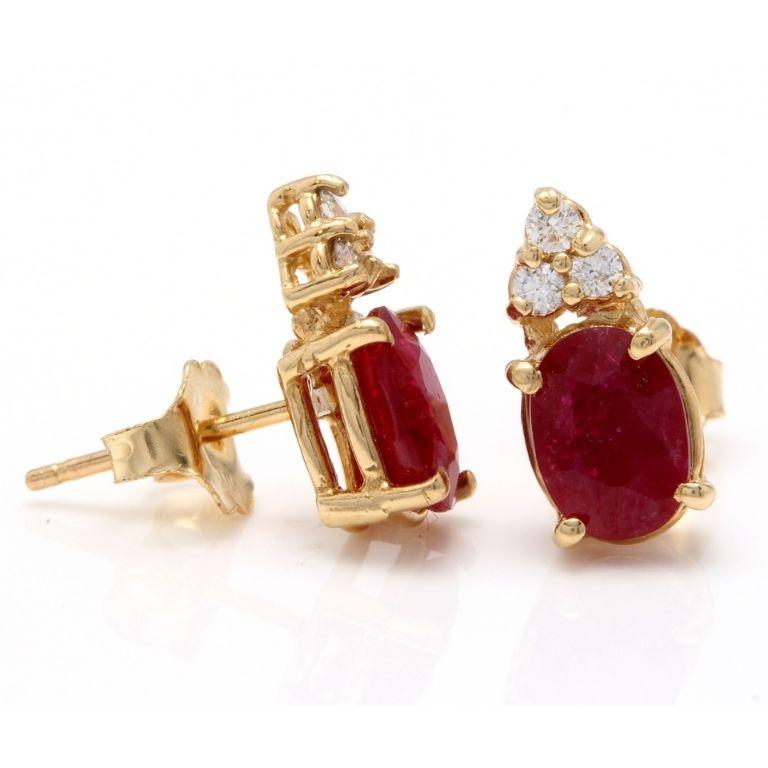 Exquisite 3.16 Carats Natural Untreated Red Ruby and Diamond 14K Solid Yellow Gold Stud Earrings

Amazing looking piece!

Total Natural Round Cut White Diamonds Weight: Approx. 0.16 Carats (color G-H / Clarity SI1-SI2)

Total Natural Oval Cut Red