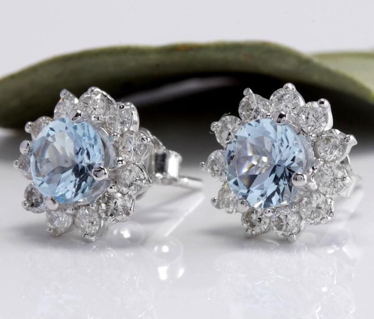 Exquisite 3.25 Carats Natural Aquamarine and Diamond 14K Solid White Gold Stud Earrings

Amazing looking piece!

Total Natural Round Cut White Diamonds Weight: Approx. 1.00 Carat (color G-H / Clarity SI1-SI2)

Total Natural Round Cut Aquamarines