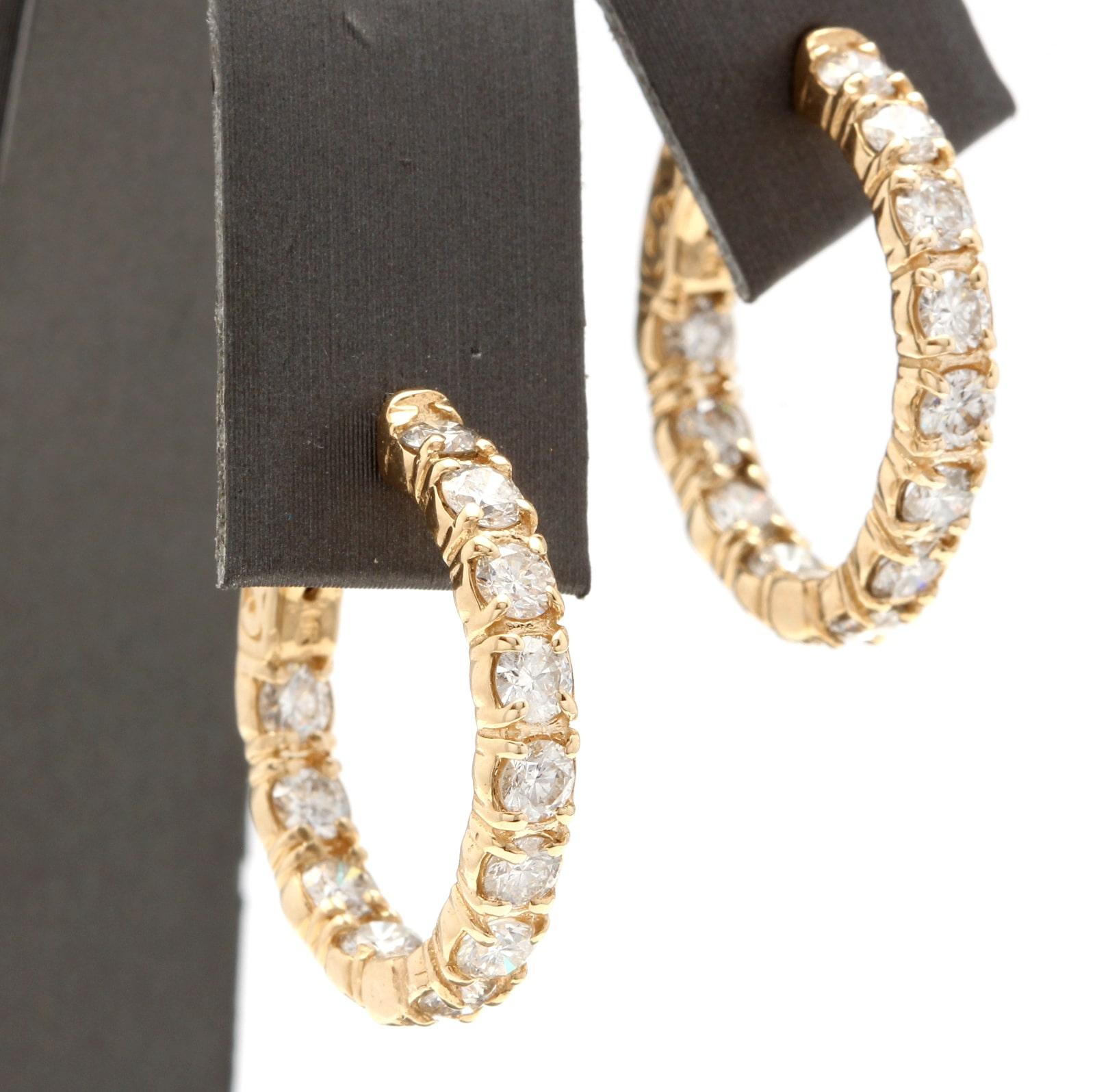 Exquisite 3.50 Carats Natural Diamond 14K Solid Yellow Gold Hoop Earrings

Amazing looking piece!

Inside Out Diamonds.

Earrings have safety lock.

Total Natural Round Cut White Diamonds Weight: Approx. 3.50 Carats (color G-H / Clarity