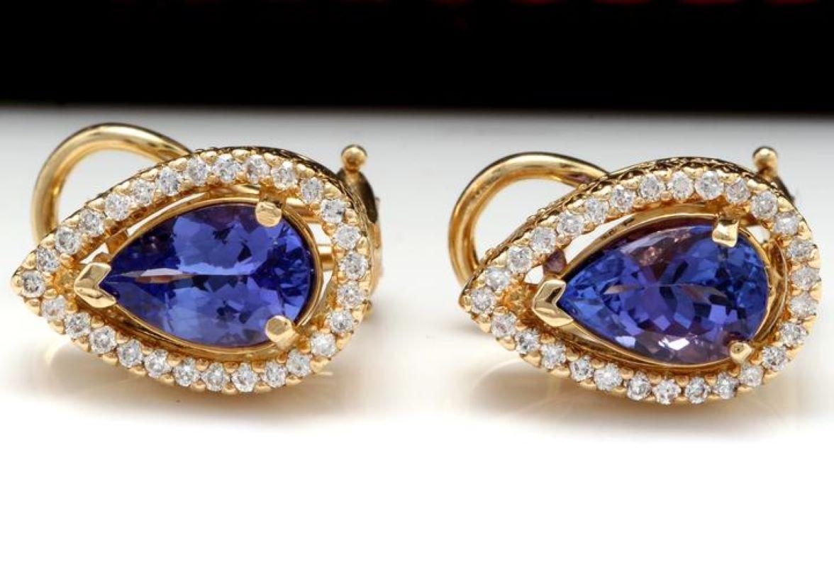Exquisite 3.75 Carats Natural Tanzanite and Diamond 14K Solid Yellow Gold Stud Earrings

Amazing looking piece!

Total Natural Round Cut White Diamonds Weight: .75 Carats (color G-H / Clarity SI1-SI2)

Total Pear Cut Tanzanites Weight: 3.00