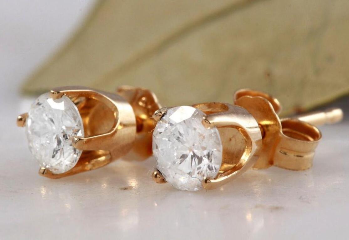 Exquisite .40 Carats Natural Diamond 14K Solid Yellow Gold Stud Earrings

Amazing looking piece!

Total Natural Round Cut Diamonds Weight: .40 Carats (both earrings) VS2-SI1 / H

Diamond Measures: 3.8mm

Total Earrings Weight is: 0.7