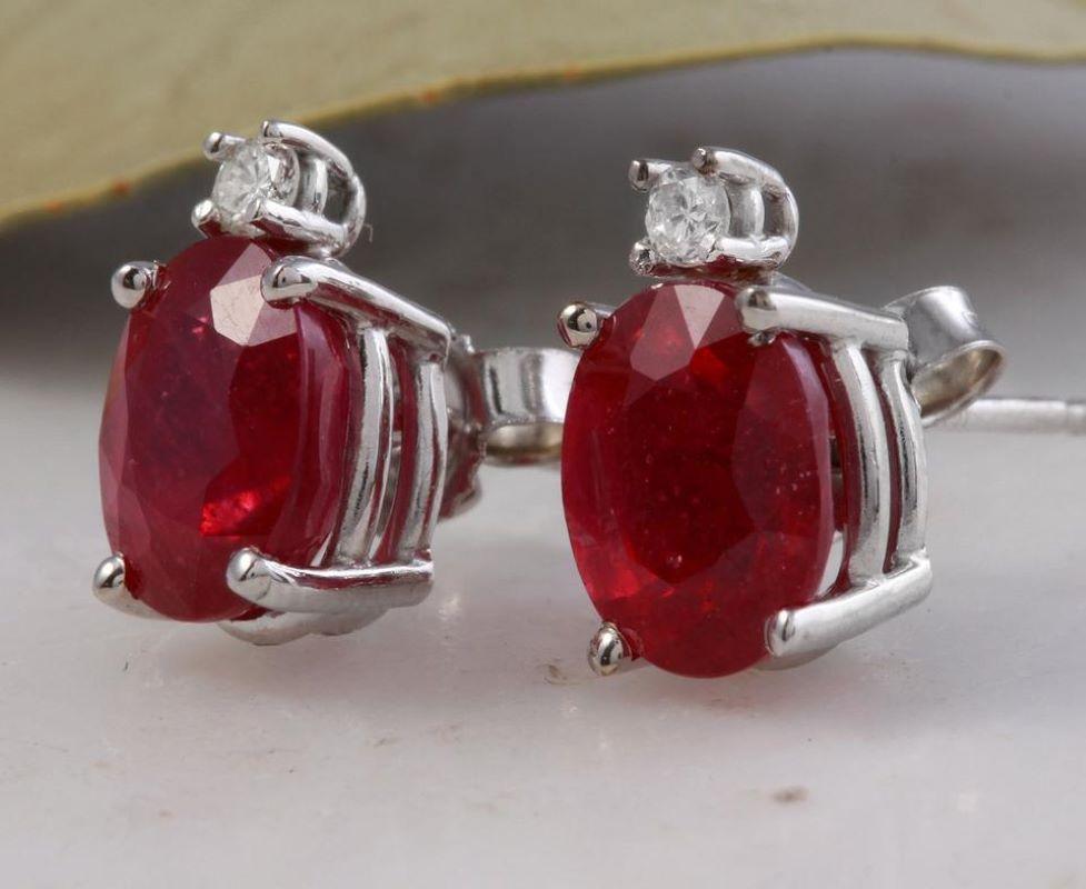 Exquisite 4.18 Carats Natural Red Ruby and Diamond 14K Solid White Gold Stud Earrings

Amazing looking piece!

Total Natural Round Cut White Diamonds Weight: .06 Carats (color G-H / Clarity SI1-SI2)

Total Natural Oval Cut Red Rubies Weight: 4.18