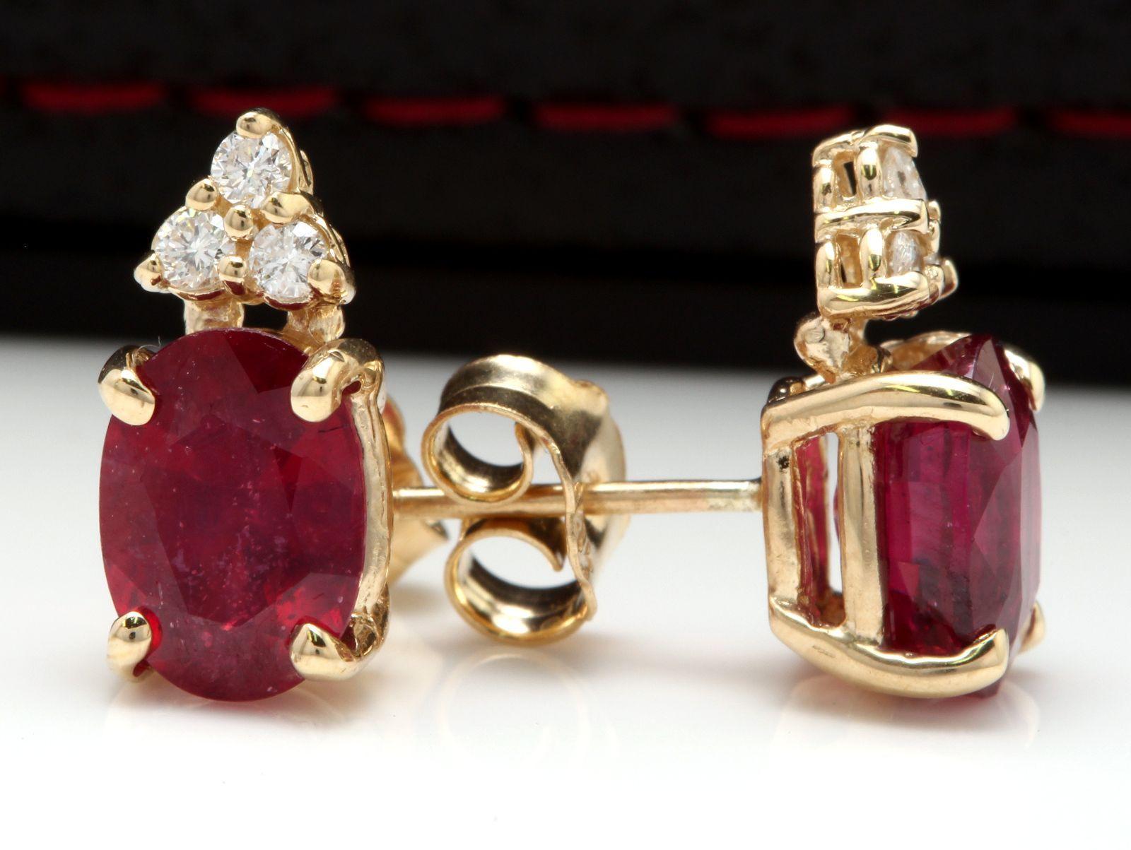 Exquisite 4.20 Carats Red Ruby and Diamond 14K Solid Yellow Gold Stud Earrings

Amazing looking piece!

Total Natural Round Cut White Diamonds Weight: Approx. 0.20 Carats (color G-H / Clarity S1-SI2)

Total Oval Cut Red Rubies Weight: Approx. 4.00