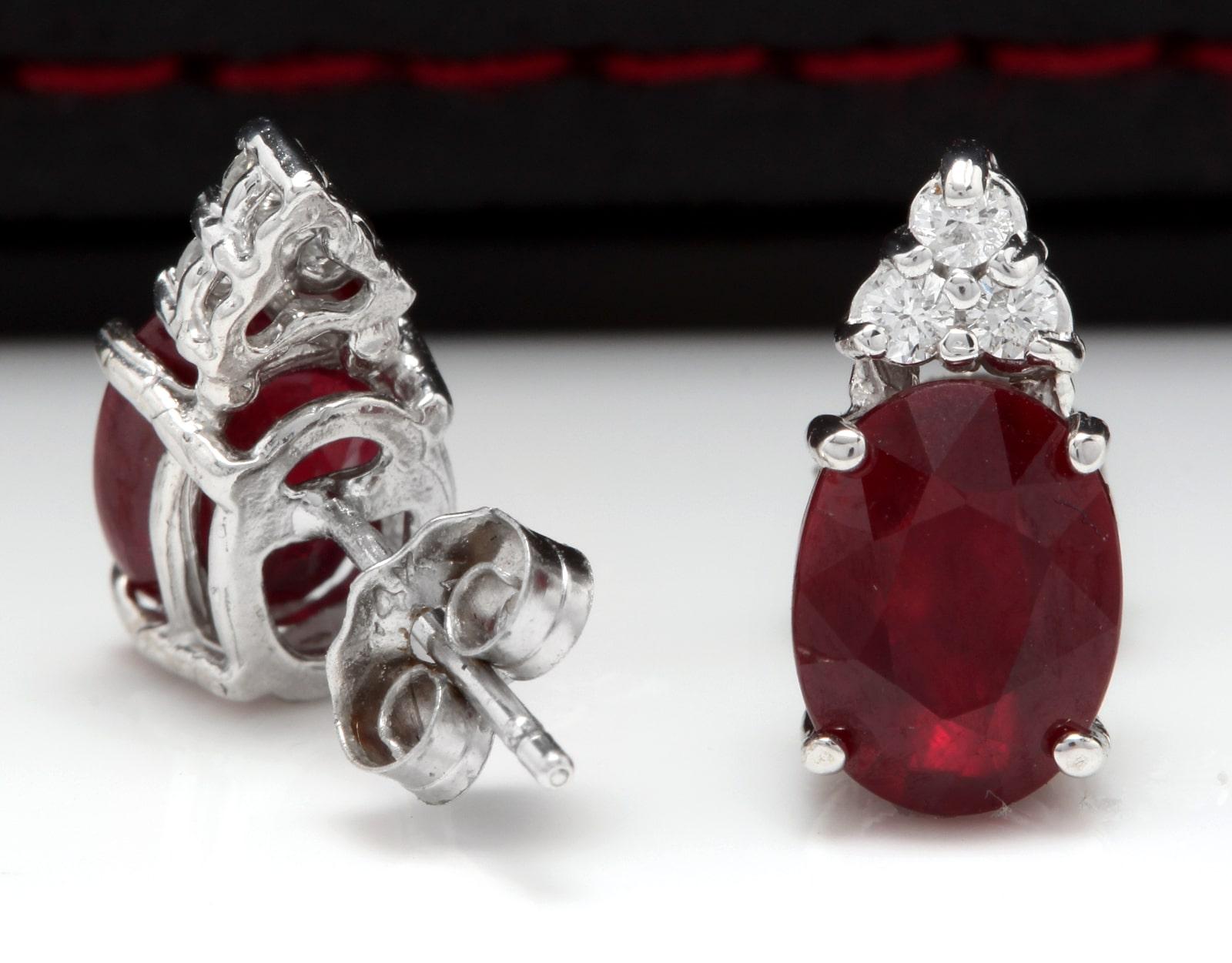 Oval Cut Exquisite 4.20 Carat Red Ruby and Natural Diamond 14 Karat Solid White Gold Stud For Sale
