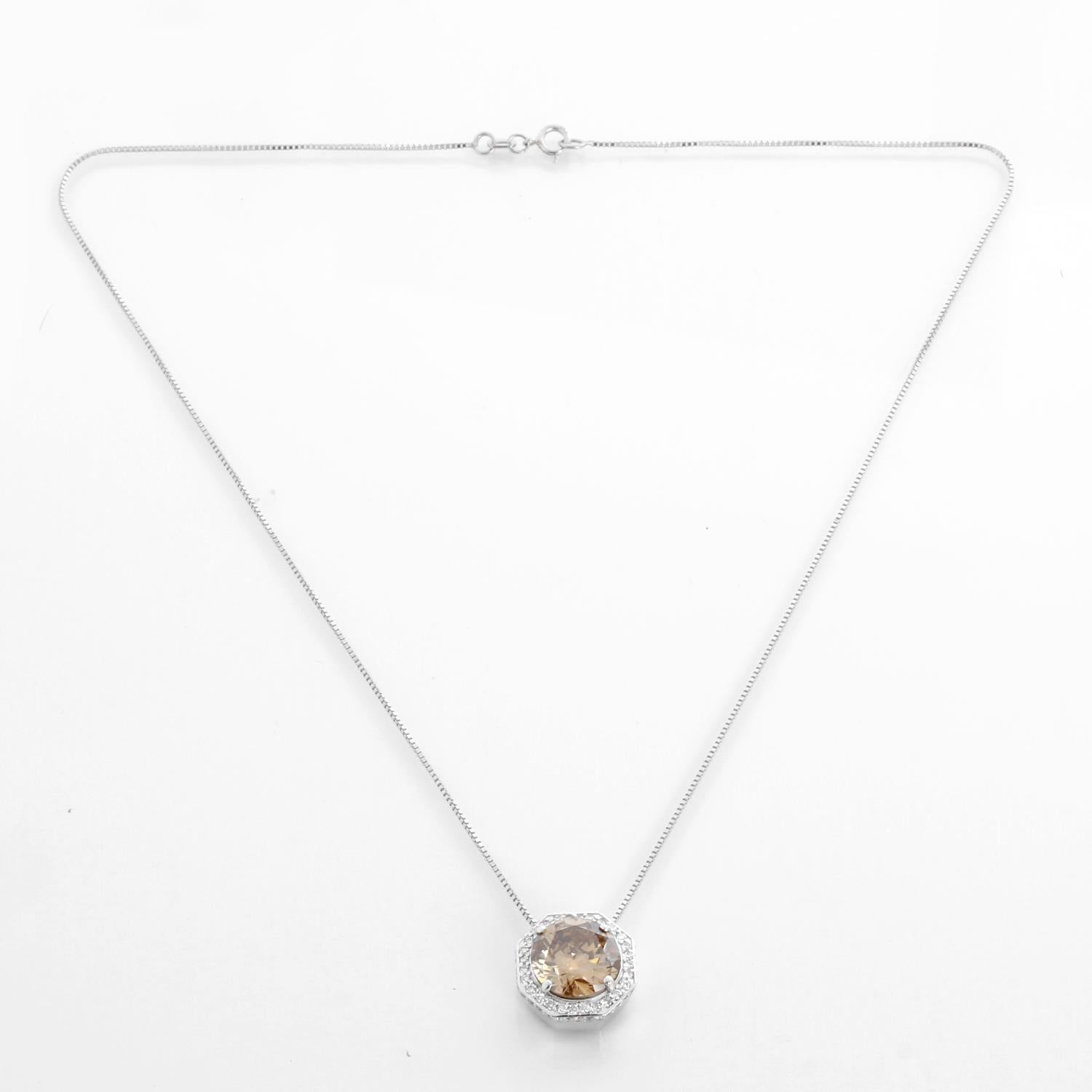 Exquisite 4.30 Carat Yellowish Brown Diamond Pendant - A captivating 4.30 carat yellowish brown diamond takes center stage in this elegant pendant, surrounded by a shimmering halo of white diamonds that enhance its rich hue. Set in white gold and