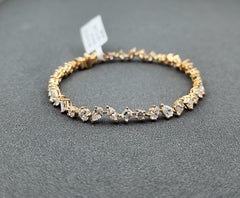 Exquisite 5.57 ct Mixed-Shape Diamond 18K Yellow Gold Tennis Bracelet