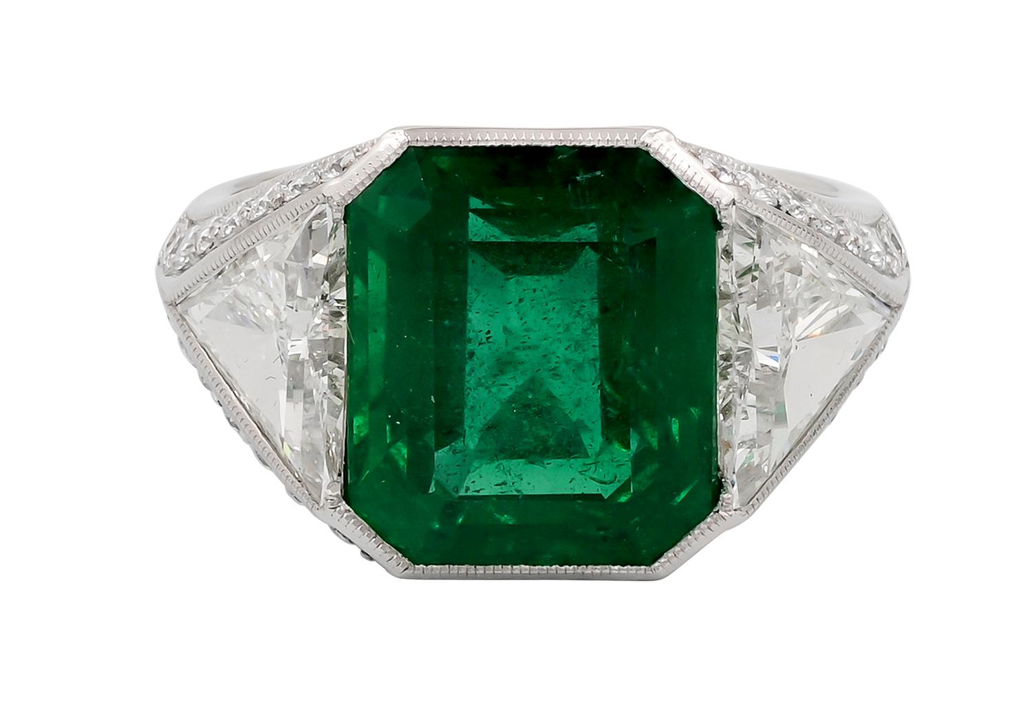 Sophia D 5.80 Carat Emerald Platinum Ring Flanked with 1.67 Carat Diamonds and 0.47 Carat Small Diamonds.

The size is a 6.5 and available for resizing.

Sophia D by Joseph Dardashti LTD has been known worldwide for 35 years and are inspired by