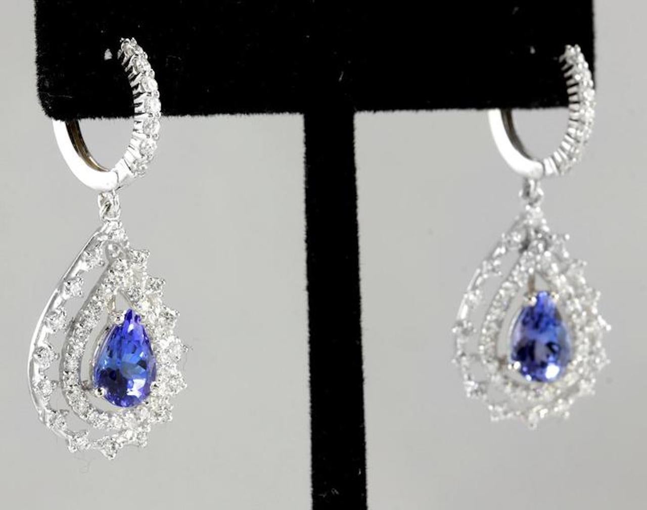 Exquisite 6.00 Carats Natural Tanzanite and Diamond 14K Solid White Gold Stud Earrings

Amazing looking piece!

Total Natural Round Cut White Diamonds Weight: 2.50Carats (color F-G / Clarity VS2-SI1)

Total Natural Round Cut Tanzanites Weight: 3.50