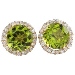 Exquisite 6.12 Carat Natural Green Peridot and Diamond 14 Karat Solid Gold