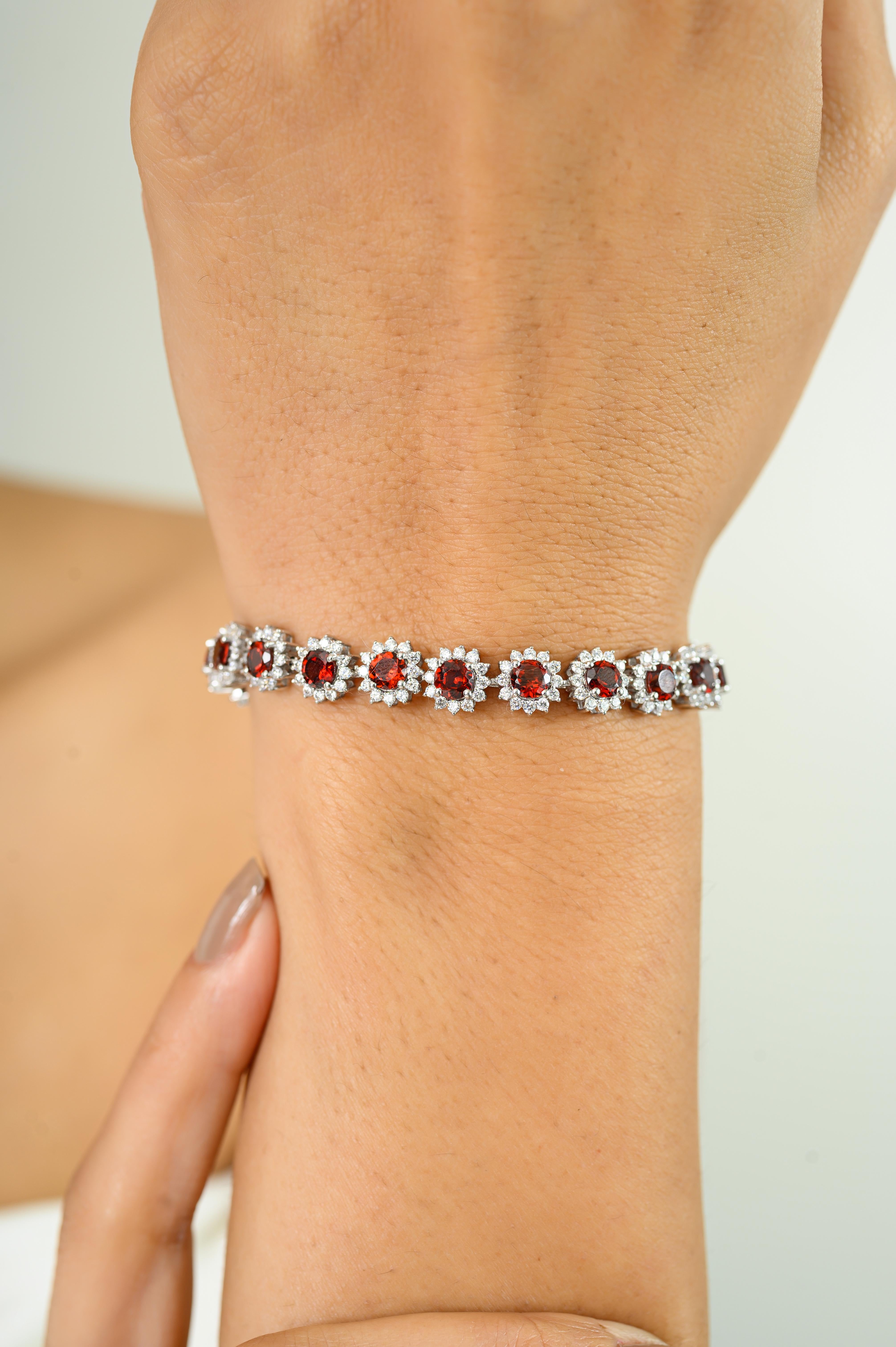 This Exquisite 7.32 CTW Deep Red Garnet Tennis Bracelet exquisite 925 sterling silver bracelet, showcasing 7.32 carats of natural red garnets. Each vibrant garnet is surrounded by a halo of dazzling cubic zirconia stones, totaling 4.86 carats,