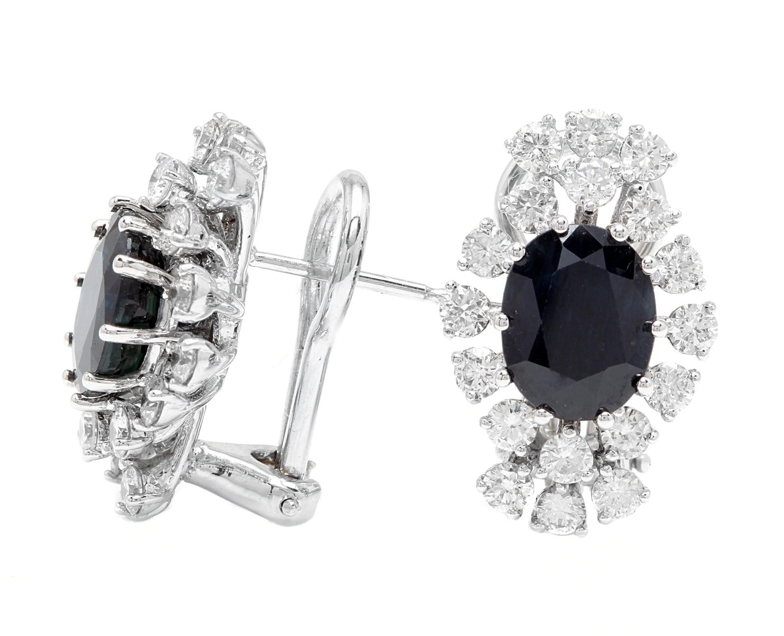 Exquisite 8.00 Carats Natural Sapphire and Diamond 14K Solid White Gold Earrings

Amazing looking piece!

Total Natural Round Cut White Diamonds Weight: Approx. 2.00 Carats (color G-H / Clarity SI1-SI2)

Total Natural Oval Cut Sapphires Weight: