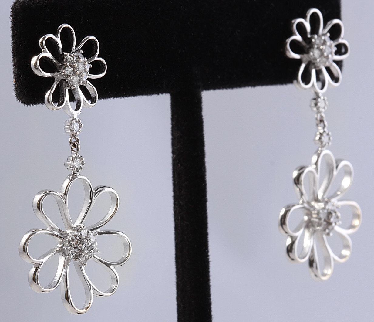 Boucles d'oreilles exquises en or blanc massif 18 carats avec diamant naturel de 0,85 carat

Une pièce étonnante !

Poids total des diamants blancs naturels de taille ronde : .85 Carats (couleur G-H / Clarté SI1)

Les mesures des boucles d'oreilles