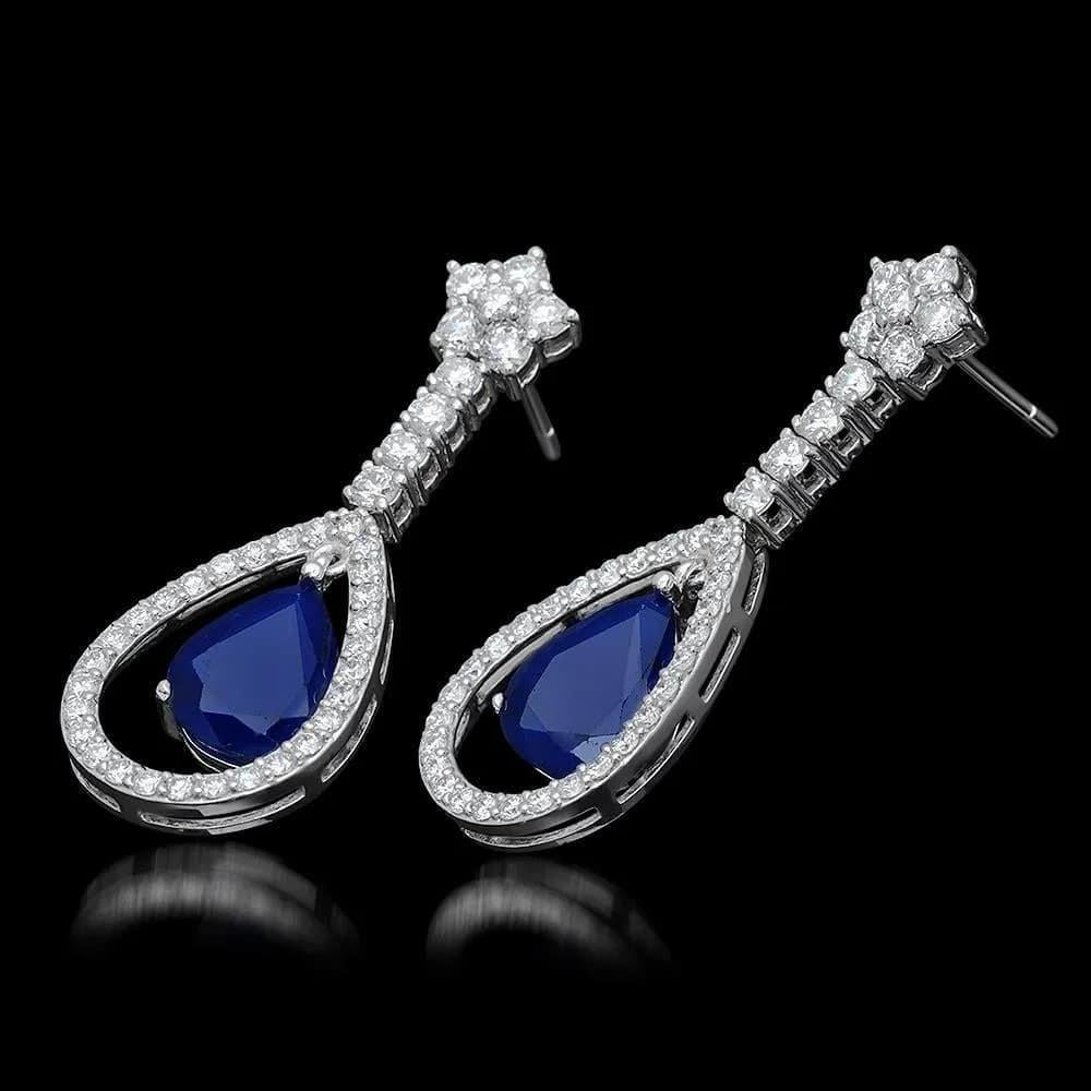 Exquisite 9.00 Carats Natural Sapphire and Diamond 14K Solid White Gold Earrings

Total Natural Round Diamonds Weight: Approx. 2.60 Carats (color G-H / Clarity SI1-SI2)

Total Natural Pear Shaped Sapphire Weight: Approx. 6.40 Carats

Sapphire
