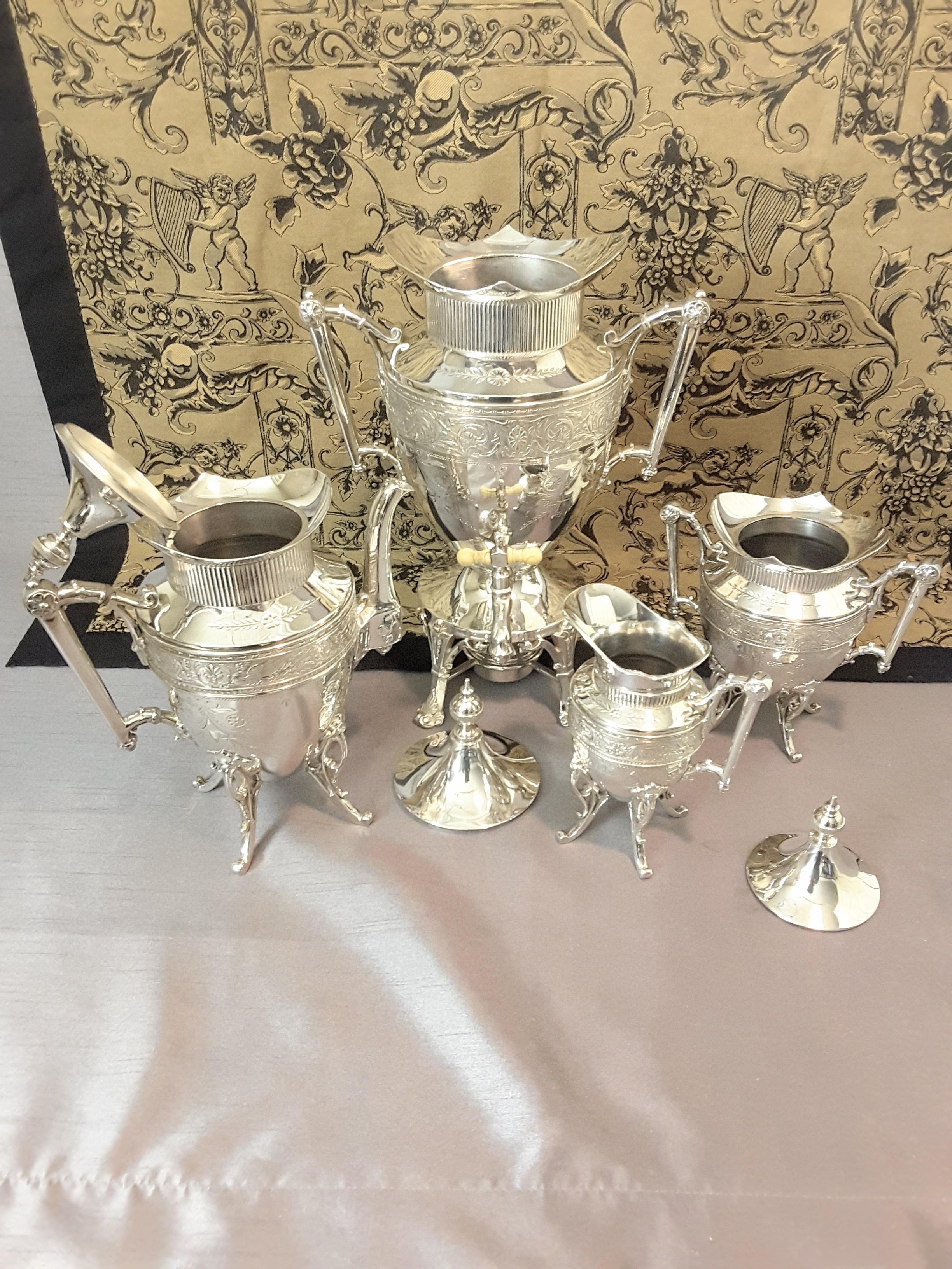 Exquisite Aesthetic Movement Silverplated Tea Service by Simpson, Hall & Miller For Sale 1