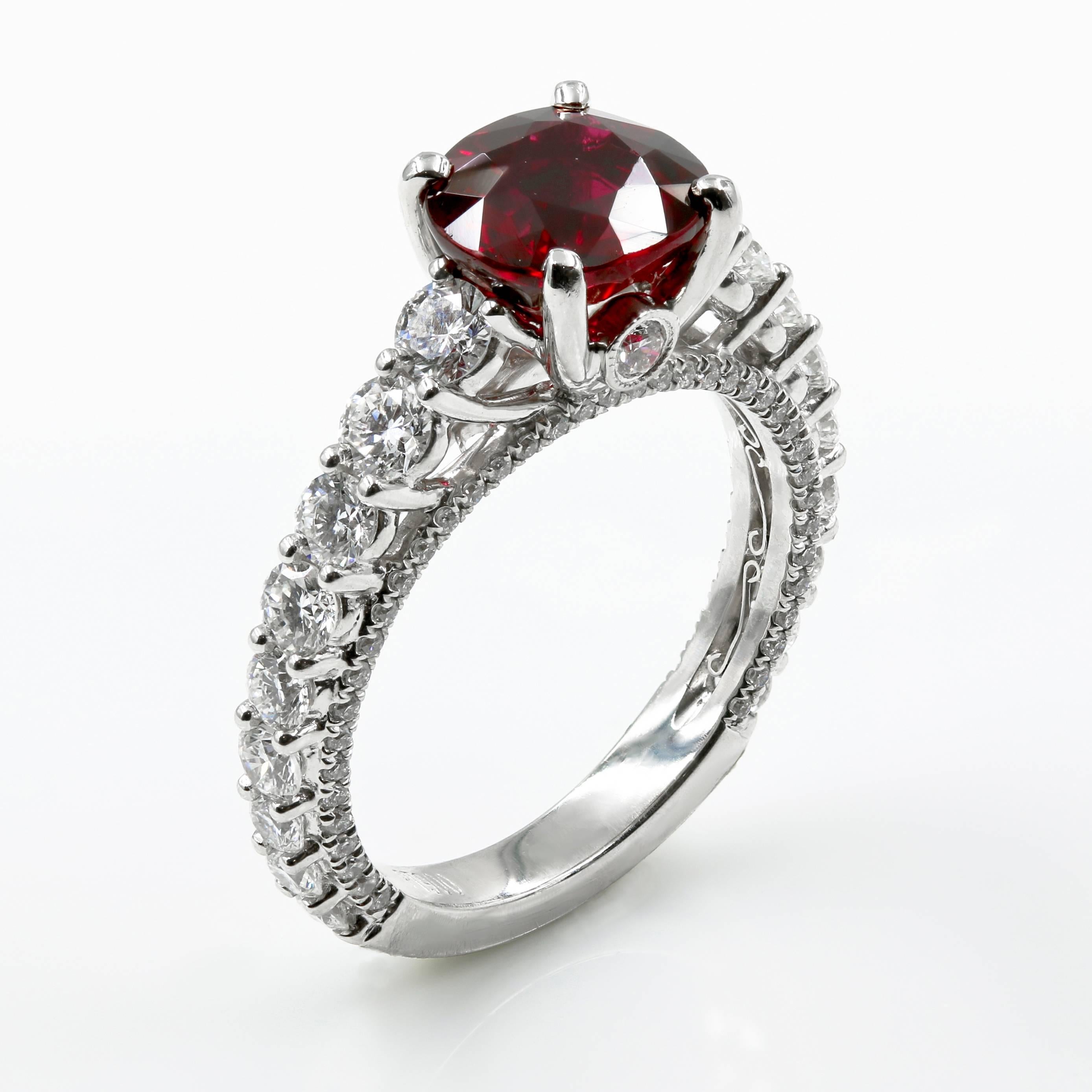 This exquisite ruby & diamond ring features a Natural Ruby - 2.78cts., 80 round brilliant cut diamonds approx.  0.25ct. tw., and 20 round brilliant cut diamonds approx. 1.06cts. tw. -The ring is Platinum (stamped PT900)

The piece comes with